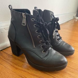 Black booties with zip detail